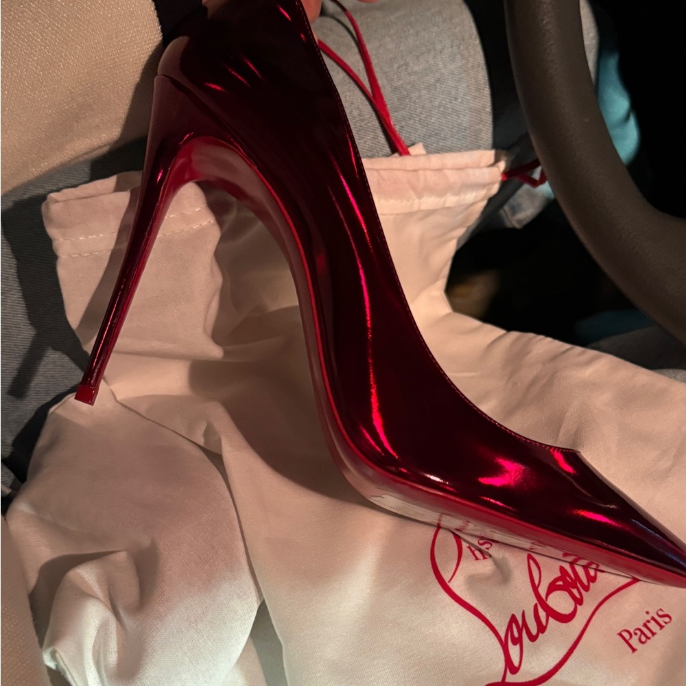 Red color, Christian Louboutin classy high heels on sale never worn 40.5